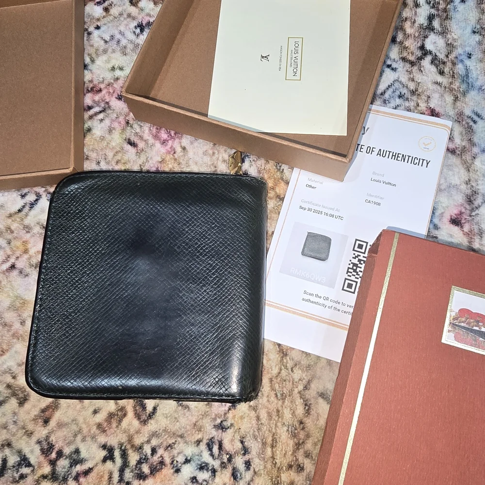 Full Inclusion Louis Vuitton Green Tiaga Zip Around Organizer. COA Included